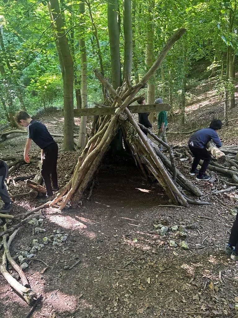 Bushcraft shelter building at Back 2 Bear